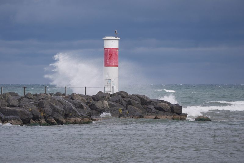 Wind whips up waves on Lake Ontario in Irondequoit on Oct. 20, 2025 with large waves crashing against the breakwall.