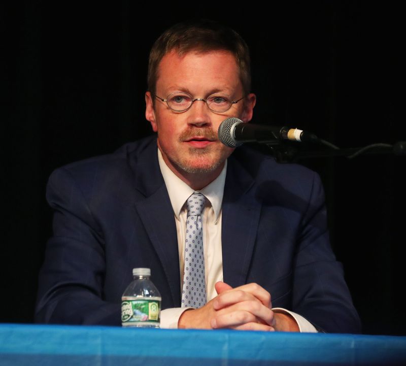 Dutchess County Comptroller Dan Aymar-Blair on stage at the Cunneen-Hackett Theater for the Northern Dutchess NAACP Meet the Candidates event on October 22, 2025.
