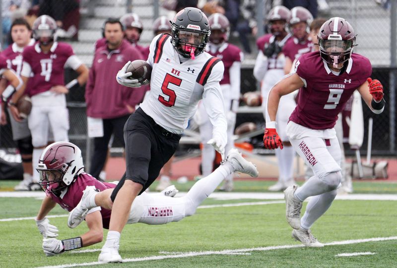 Rye’s Henry Shoemaker (5) looks for room in the Harrison defense after a catch during action at Harrison High School Oct. 25, 2025. Rye won the game 49-28.