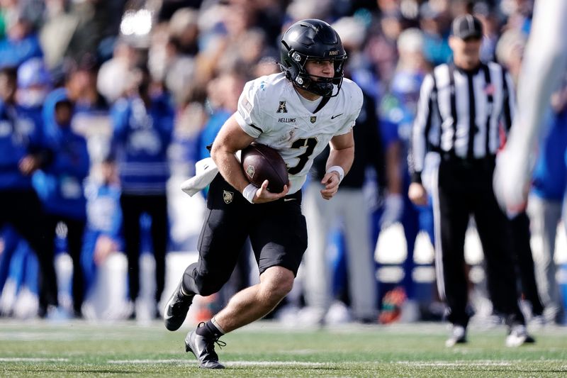 Nov 1, 2025; Colorado Springs, Colorado, USA; Army West Point Black Knights quarterback Cale Hellums (3) runs the ball in the second quarter against the Air Force Falcons at Falcon Stadium. Mandatory Credit: Isaiah J. Downing-Imagn Images