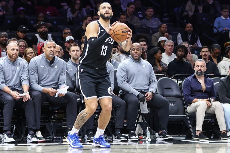 Oct 29, 2025; Brooklyn, New York, USA; Brooklyn Nets guard Tyrese Martin (13) takes a three point shot in the second quarter against the Atlanta Hawks at Barclays Center. Mandatory Credit: Wendell Cruz-Imagn Images
