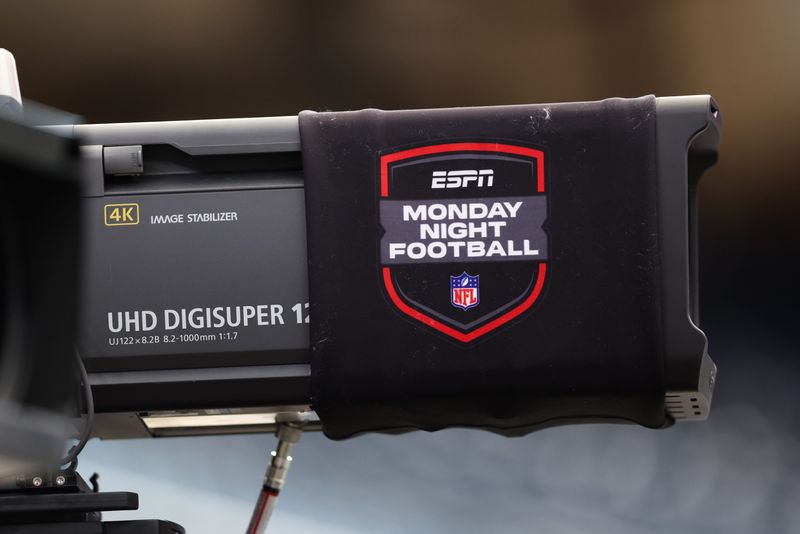 Sep 15, 2025; Houston, Texas, USA; A broadcast camera is wrapped in a Monday Night Football logo before the game between the Houston Texans and the Tampa Bay Buccaneers at NRG Stadium.