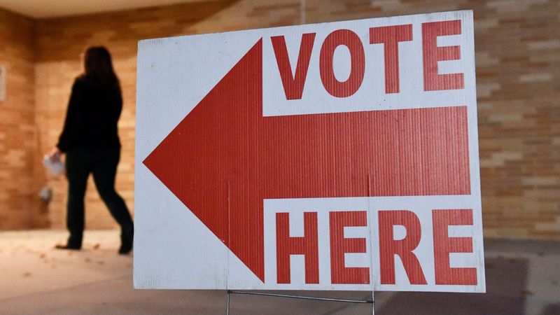 Shortly before 6 a..m., a voter arrives to cast their ballot at Cherry Hill East High School in Cherry Hill, NJ, on Election Day, Tuesday, November 4, 2025.