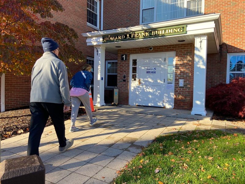 Voters walk into Penfield Town Hall to cast their ballots on Election Day, Nov. 4, 2025.