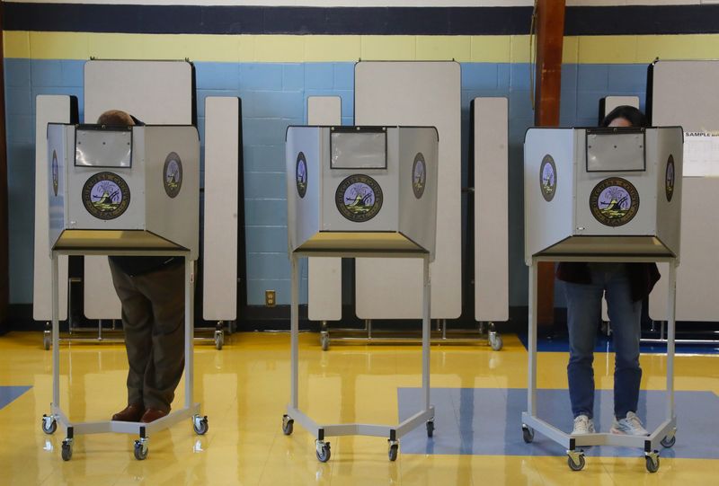 Voters fill in their ballots at Vassar Road Elementary School in the Town of Poughkeepsie on November 4, 2025.