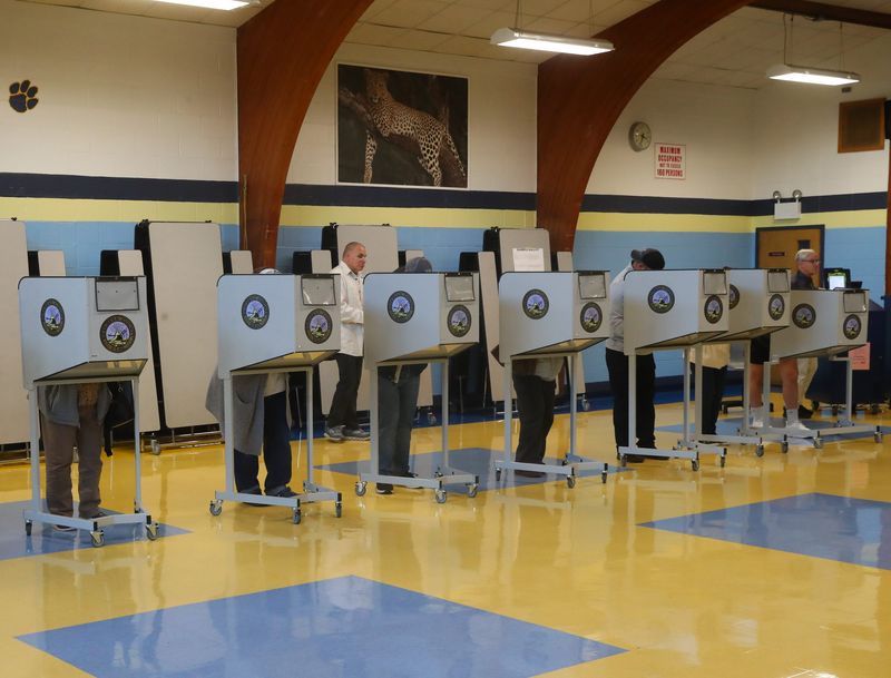 Voters fill in their ballots at Vassar Road Elementary School in the Town of Poughkeepsie on November 4, 2025.