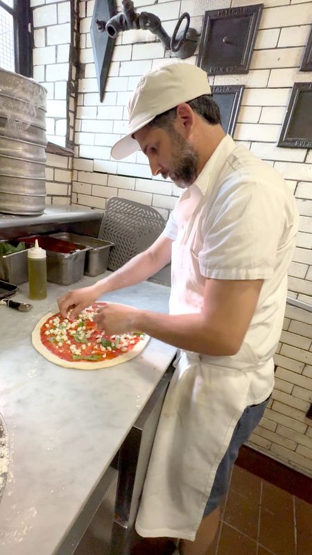 Owner Matt Di Gesu makes a pizza at Pizzeria La Rosa in New Rochelle Oct. 23, 2025.