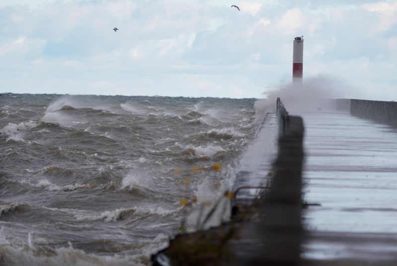 Winds whip up Lake Ontario with waves kicking back towards other waves after hitting the ipier at Ontario Beach in Rochester on Nov. 6, 2025.