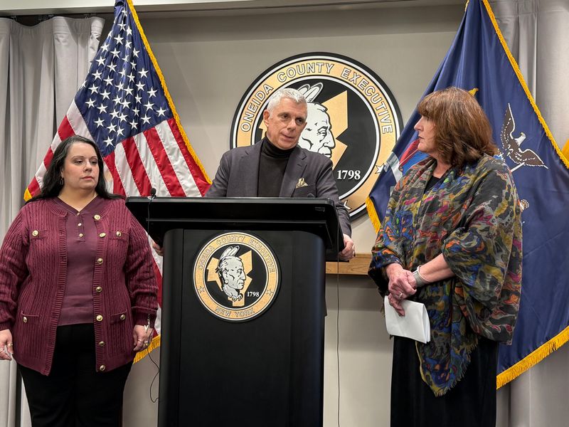 Oneida County Executive Anthony Picente Jr, center, flanked by Maryellen Chainey, left, director of income maintenance, and Colleen Fahy-Box, right, commissioner of family and community services, speaks at a press conference on Nov. 6, 2025 at the Oneida County Office Building. Picente addressed hunger in the county following a disruption to Supplemental Nutrition Assistance Program, or SNAP, benefits during the federal government shutdown.