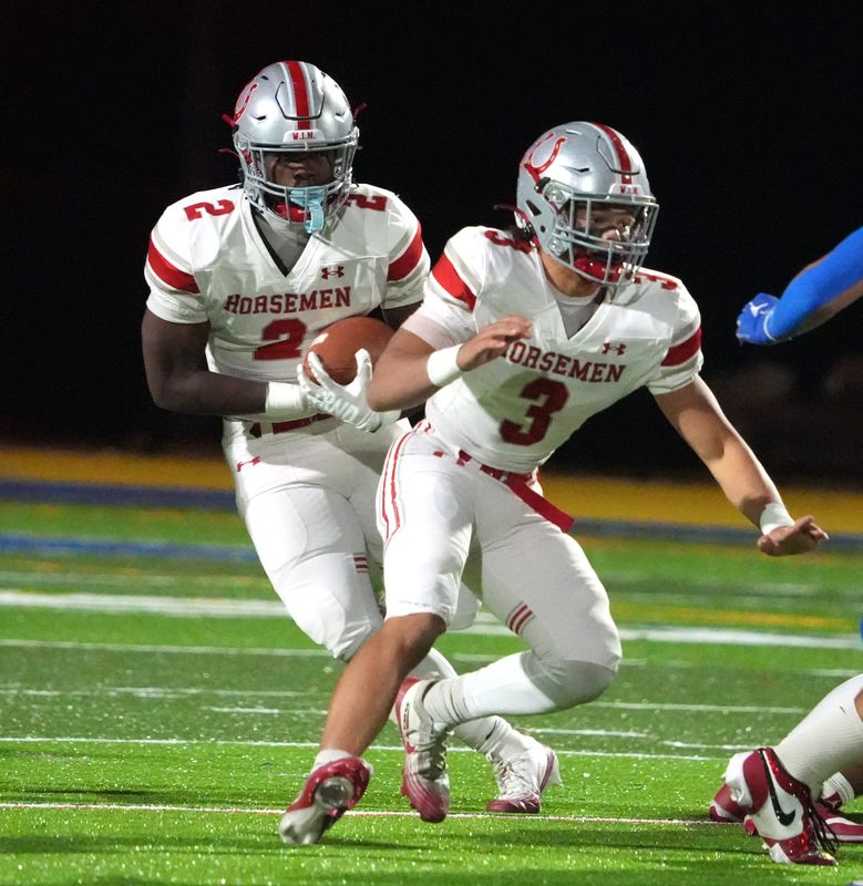 Sleepy Hollow's Brayden Richardson runs for a touchdown behind blocker Thomas Hudson during a Section 1 Class B football semifinal at Ardsley Nov. 7, 2025.