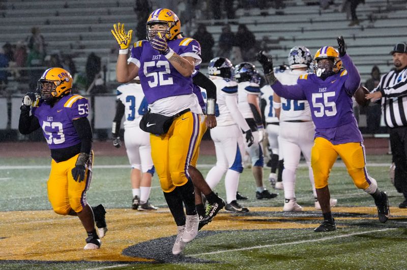 East/WOIS’s Jamie Anderson Jr. (52) starts to celebrate as time expires giving them the victory over Brockport 34-7 in their Section V Class A2 football sectional championship finals Friday, Nov. 7, 2025 at SUNY Brockport.