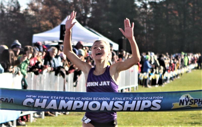 John Jay-Cross River's Sloan Wasserman sets a Queensbury High course record for girls Nov. 15, 2025 as she wins the state Class B girls cross-country championship. Her team also won the team Class B title, beating 10 other schools.