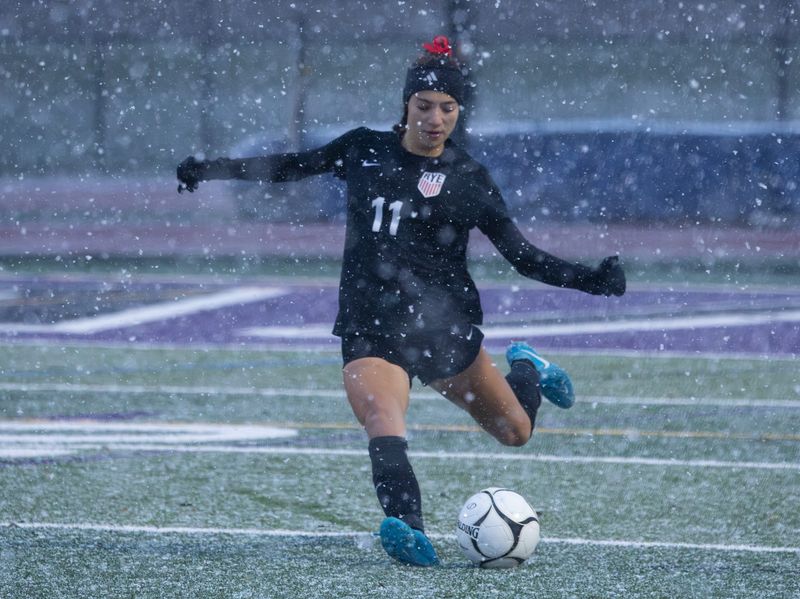 Rye's Shira Rand clears the ball during the New York State Class A girls soccer championship Sunday, Nov. 16 at Cortland High School.