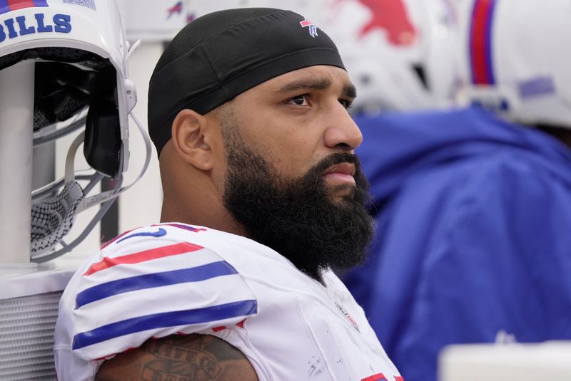 Buffalo Bills defensive tackle DaQuan Jones takes a seat while the offensive line is on the field during first half action against the Tampa Bay Buccaneers on Nov 16, 2025 at Highmark Stadium in Orchard Park.