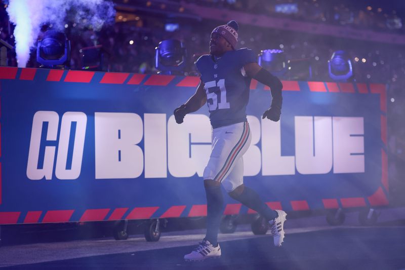 Oct 9, 2025; East Rutherford, New Jersey, USA; New York Giants linebacker Abdul Carter (51) runs onto the field prior to the game against the Philadelphia Eagles at MetLife Stadium. Mandatory Credit: Vincent Carchietta-Imagn Images