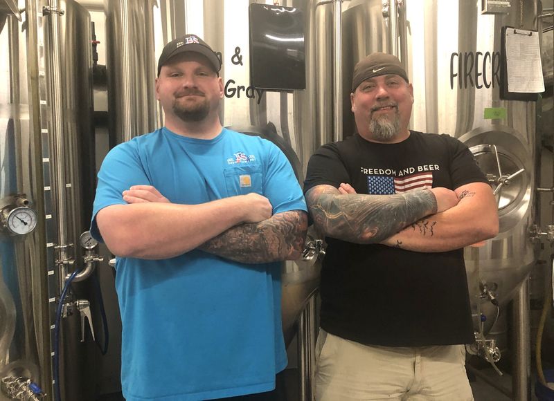 Todd Wager and Benjamin Noragong take a break from making award-winning craft beer at No BS Brewing Co. in Livonia.