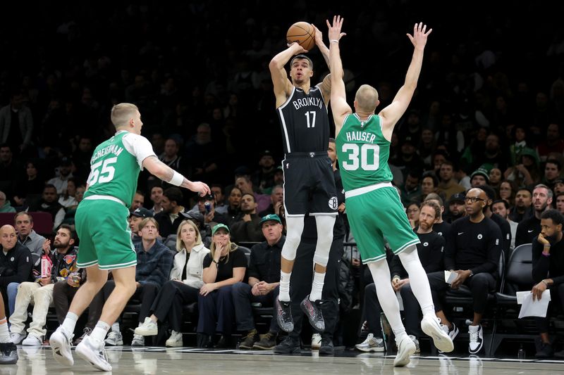 Nov 18, 2025; Brooklyn, New York, USA; Brooklyn Nets forward Michael Porter Jr. (17) shoots a three point shot against Boston Celtics guard Baylor Scheierman (55) and forward Sam Hauser (30) during the fourth quarter at Barclays Center. Mandatory Credit: Brad Penner-Imagn Images