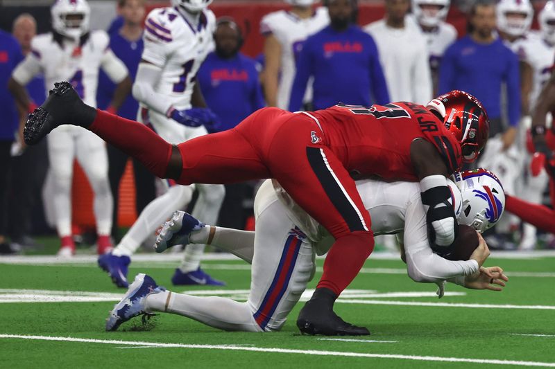 Nov 20, 2025; Houston, Texas, USA; Houston Texans defensive end Will Anderson Jr. (51) sacks Buffalo Bills quarterback Josh Allen (17) in the first half at NRG Stadium. Mandatory Credit: Thomas Shea-Imagn Images