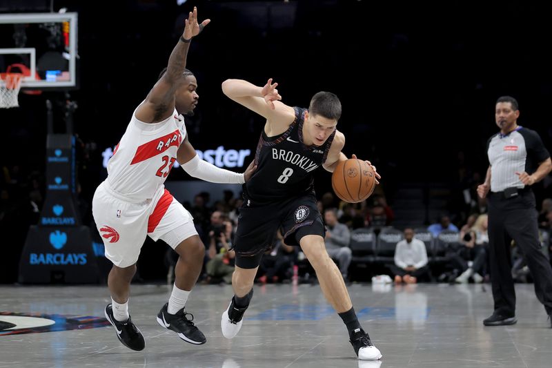 Nov 11, 2025; Brooklyn, New York, USA; Brooklyn Nets guard Egor Demin (8) brings the ball up court against Toronto Raptors guard Jamal Shead (23) during the fourth quarter at Barclays Center. Mandatory Credit: Brad Penner-Imagn Images