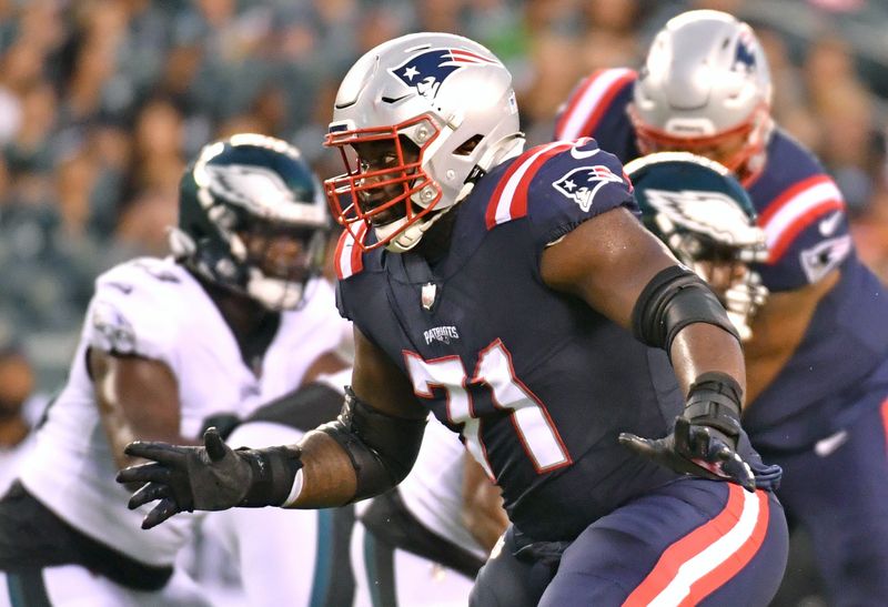 Aug 19, 2021; Philadelphia, Pennsylvania, USA; New England Patriots offensive guard Mike Onwenu (71) blocks against the Philadelphia Eagles at Lincoln Financial Field. Mandatory Credit: Eric Hartline-USA TODAY Sports
