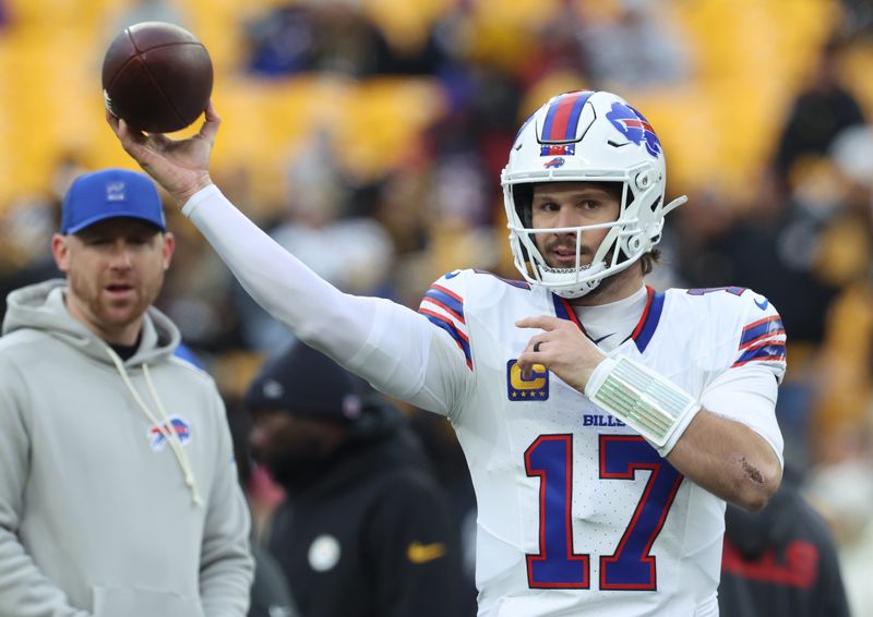 Nov 30, 2025; Pittsburgh, Pennsylvania, USA; Buffalo Bills quarterback Josh Allen (17) warms up before the game against the Pittsburgh Steelers at Acrisure Stadium. Mandatory Credit: Charles LeClaire-Imagn Images
