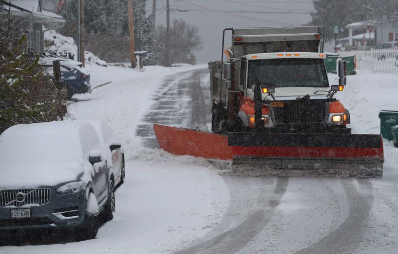 A Town of Poughkeepsie plow truck clears Main Street in New Hamburg on December 2, 2025.