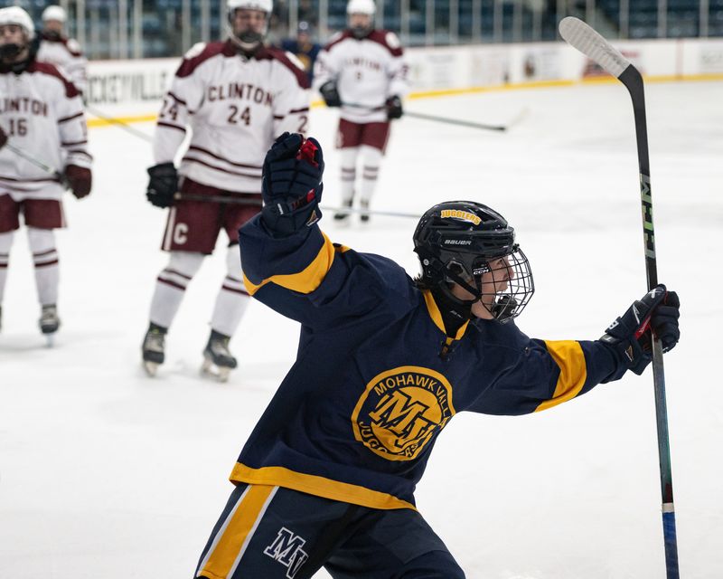 Mohawk Valley Juggler Tommy Vanlieshout celebrates after scoring a goal at Clinton Arena in December.