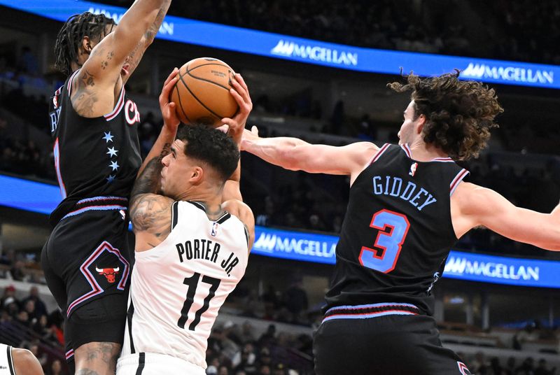 Dec 3, 2025; Chicago, Illinois, USA; Brooklyn Nets forward Michael Porter Jr. (17) drives to the basket against Chicago Bulls forward Dalen Terry (7) and guard Josh Giddey (3) during the second half at the United Center. Mandatory Credit: Matt Marton-Imagn Images