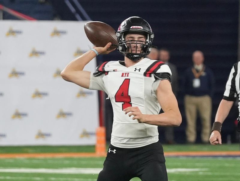 Carson Miller throws during Rye's football game against Brighton in the Class A state football championship game on Dec. 5, 2023 at JMA Wireless Dome in Syracuse.