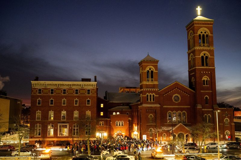 Hundreds of protesters gathered outside of Spiritus Christi Church in Rochester on Dec. 5, 2025 to demand the release of Omar Ramos Jimenez, a local father and businessman who was detained by ICE during a routine immigration check-in.