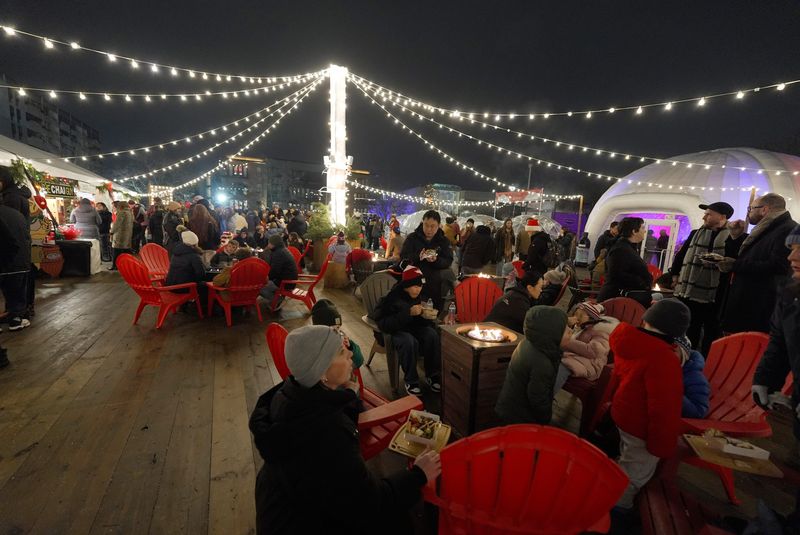 Tables were filled with families and groups of friends at Roc Holiday Village on Dec. 6, 2025 in Rochester.