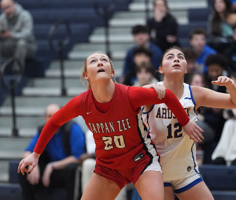 Tappan Zee's Emma McHugh boxes out awaiting a rebound against Ardsley's Morgan Macri during a Dec. 13, 2025 girls basketball game.