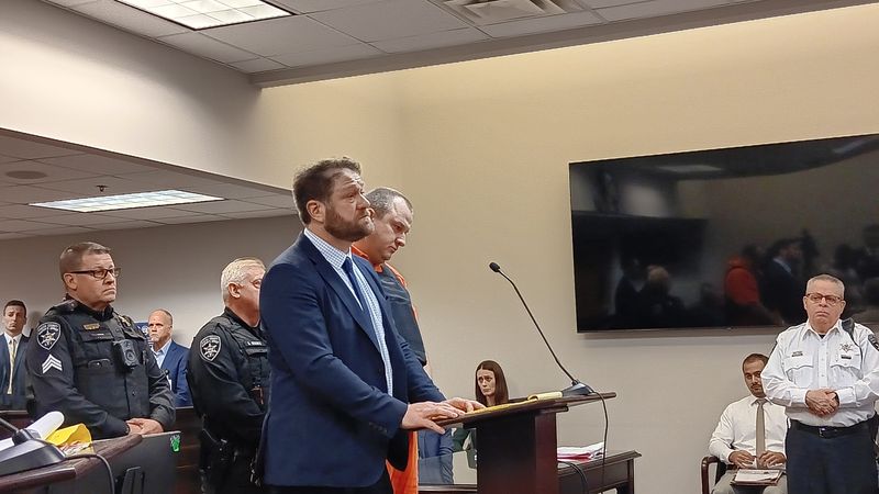 David Kingsley stands with his lawyer at sentencing on Dec. 19.