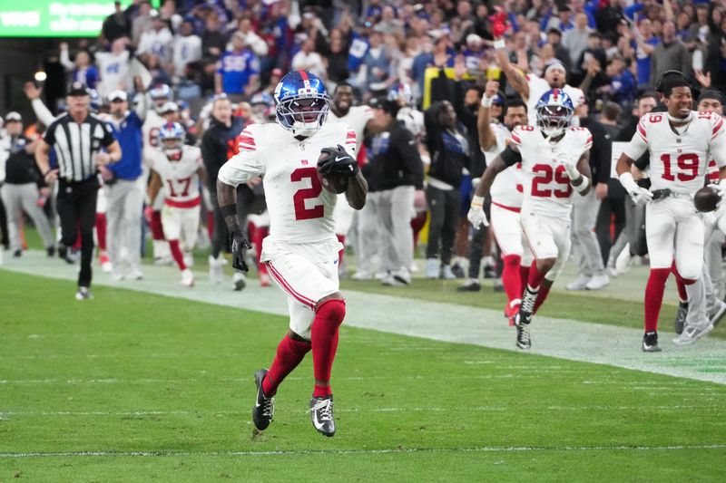 Dec 28, 2025; Paradise, Nevada, USA; New York Giants cornerback Deonte Banks (2) returns a punt for a touchdown in the second half against the Las Vegas Raiders at Allegiant Stadium. Mandatory Credit: Kirby Lee-Imagn Images