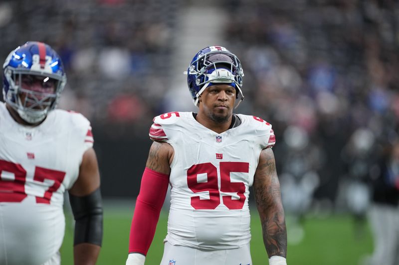 Dec 28, 2025; Paradise, Nevada, USA; New York Giants defensive tackle Roy Robertson-Harris (95) warms up before the game against the Las Vegas Raiders at Allegiant Stadium. Mandatory Credit: Kirby Lee-Imagn Images