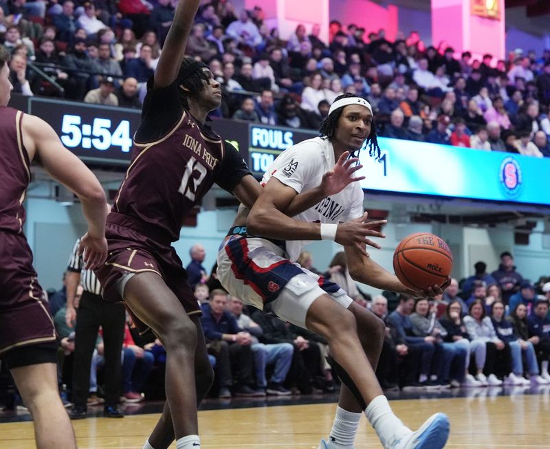 Stepinac’s Darius Ratcliff (1) drives to the basket in front of Iona’s Elijah Joseph (13) during basketball action in the Crusader Classic at the Westchester County Center Jan. 3, 2026.