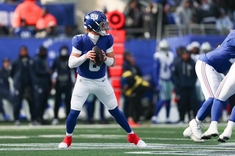 Jan 4, 2026; East Rutherford, New Jersey, USA; New York Giants quarterback Jaxson Dart (6) looks to pass during the first quarter against the Dallas Cowboys at MetLife Stadium. Mandatory Credit: Vincent Carchietta-Imagn Images
