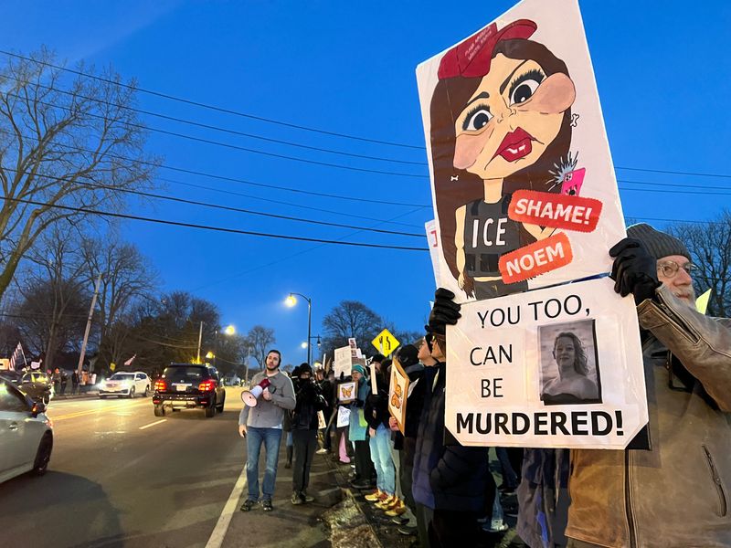 People gathered outside the Customs and Border Protection office at 171 Pattonwood Dr. to protest in response to the shooting and killing of 37-year-old Renee Nicole Good by by immigration agents.