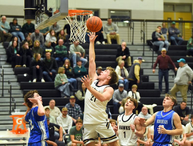 Corning's Teigen Gill goes up for a layup during a 92-53 win over Horseheads in a STAC West boys basketball game Jan. 9, 2026 at Corning-Painted Post High School.