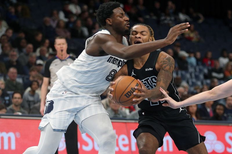 Jan 11, 2026; Memphis, Tennessee, USA; Brooklyn Nets forward Noah Clowney (21) drives to the basket as Memphis Grizzlies forward/center Jaren Jackson Jr. (8) defends during the first quarter at FedExForum. Mandatory Credit: Petre Thomas-Imagn Images