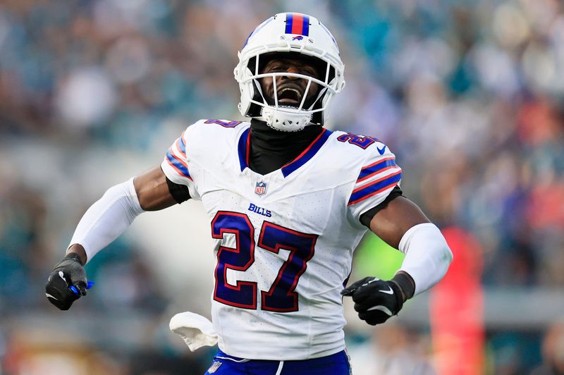 Buffalo Bills cornerback Tre'davious White (27) celebrates the game-deciding interception during the fourth quarter of an NFL football AFC Wild Card playoff matchup, Sunday, Jan. 11, 2026, in Jacksonville, Fla. The Bills defeated the Jaguars 27-24.