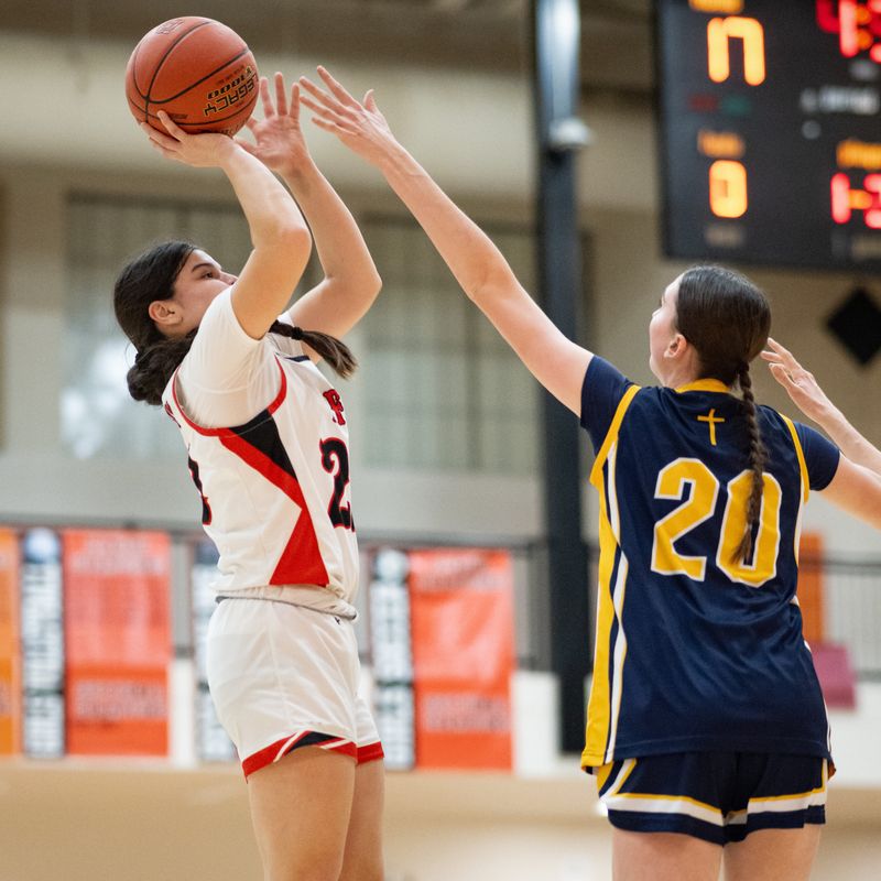 Rome Free Academy’s Haylee Bostwick shoots while under pressure from Notre Dame’s Ella Trinkaus (right) in Rome in January. Bostwick and the Black Knights are seeded fifth for Section III's Class AAA basketball playoffs while Trinkaus and the Jugglers are No. 1 in Class A.