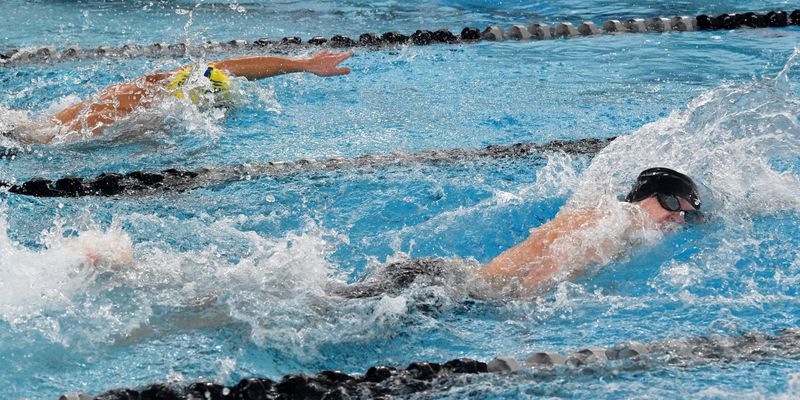 Corning's JP Sierzant, front, and Maine-Endwell's Strati Anastos took 1-2 in the boys 100-yard freestyle during M-E's 105-80 win in a STAC boys swimming & diving meet Jan. 15, 2026 at Corning-Painted Post High School.