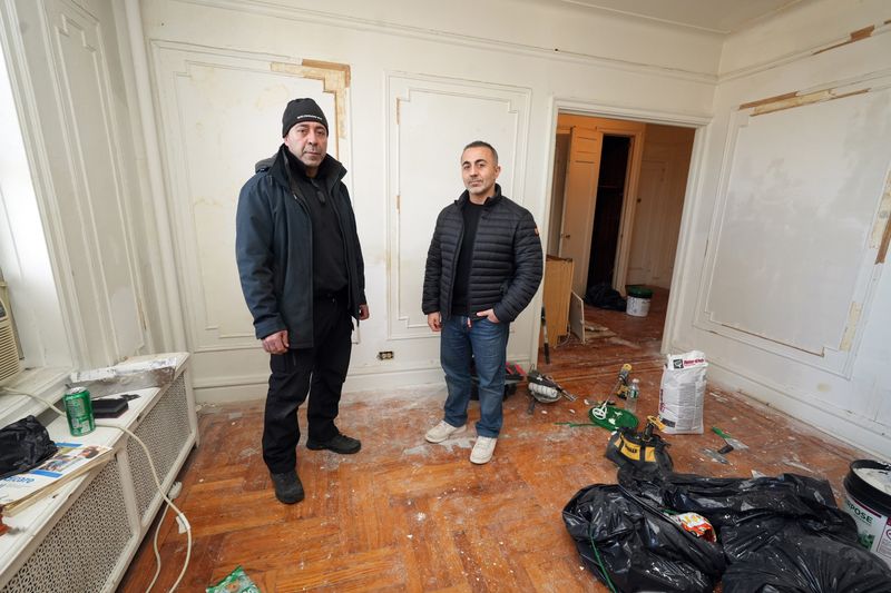 Landlords George Nukho, left, and his brother Michael Nukho, of GEM Management Partners, inside one of their vacant apartments at 461 Riverdale Avenue in Yonkers Dec. 22, 2025. They have decided to leave the apartment vacant due to the high renovation cost.