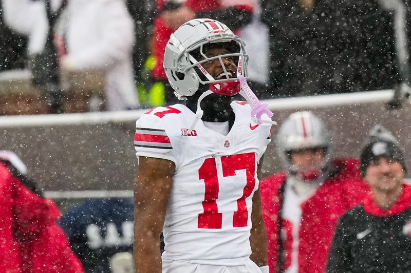 Ohio State Buckeyes wide receiver Carnell Tate (17) celebrates in the second half of the NCAA football game against the Michigan Wolverines at Michigan Stadium on Saturday, Nov. 29, 2025 in Ann Arbor, Michigan.