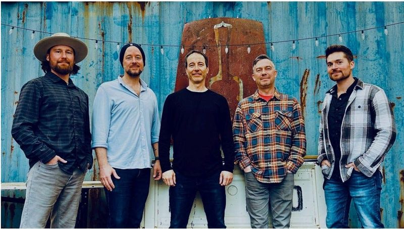 Yonder Mountain Spring Band poses for picture to promote their 2026 concert tour, including band member, Utica native Nick Piccininni who returns to the region. for their Feb. 5 show at the Stanley Theatre.