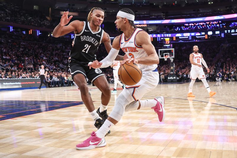 Jan 21, 2026; New York, New York, USA; New York Knicks guard Josh Hart (3) looks to drive past Brooklyn Nets forward Noah Clowney (21) in the second quarter at Madison Square Garden. Mandatory Credit: Wendell Cruz-Imagn Images