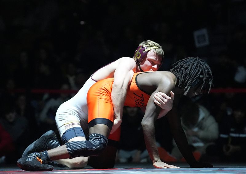 Shane Degl from Iona Prep wrestles Jamaal Wells from White Plains in the 138-pound finals at the Westchester County Wrestling Championships at Sleepy Hollow High School in Sleepy Hollow on Saturday, January 24, 2026.