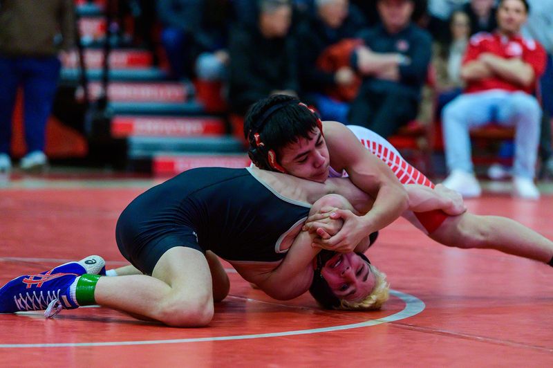 North Rockland's Liam Lin, top, wrestles Nanuet's Jack Gallagher in the 118 pound weight class during the Rockland County wrestling championship at Tappan Zee High School in Orangeburg, NY on Saturday, January 24, 2026. North Rockland's Liam Lin won the match.