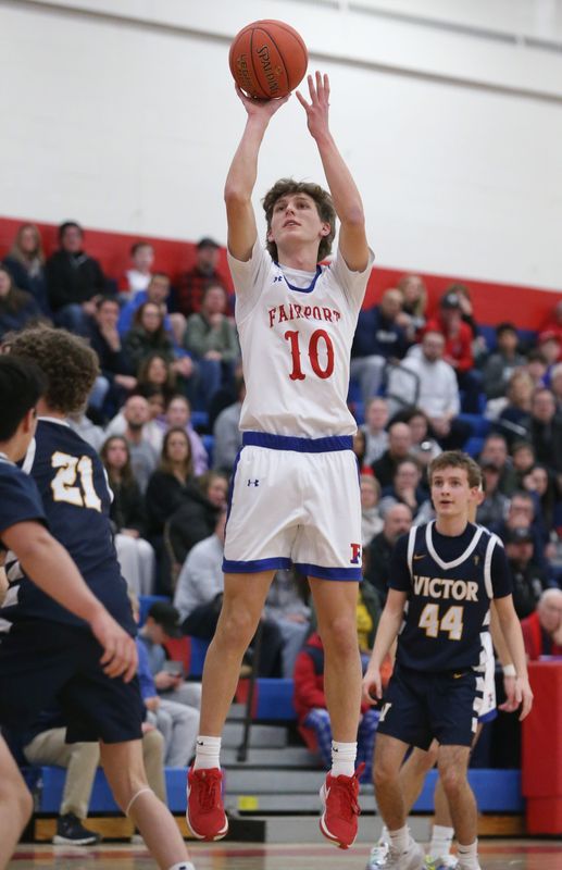 Fairport’s Alex Grejda sinks a jumper from outside the lane during their Section V boys basketball matchup Friday, Jan. 30, 2026 at Fairport High School.